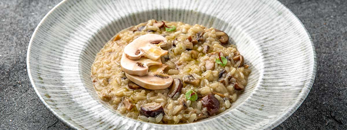 Risotto de setas, queso azul y vino blanco